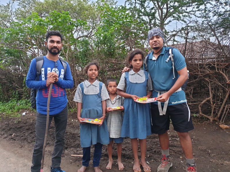 Distributing books & crayons